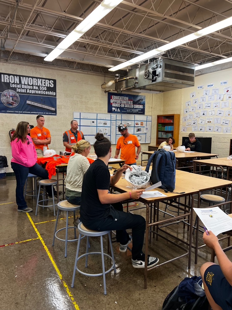 Hammond working with construction trades class